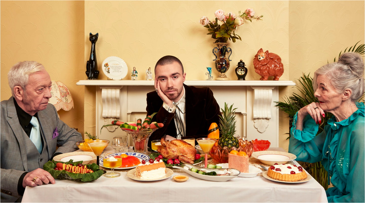 The Bad Contestant dinner table — Matt flanked by two elderly companions and a roast dinner